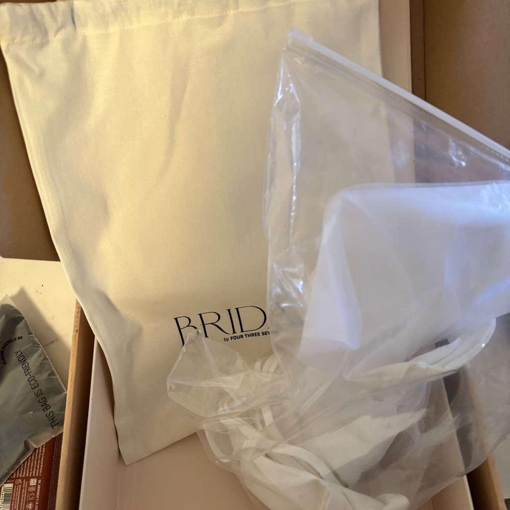 BRIDE White swimsuit with attached bow